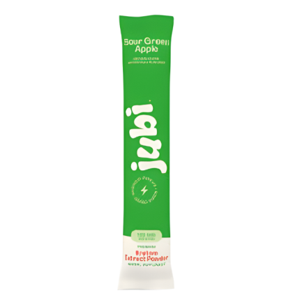 Green packet of Jujá brand instant coffee on a white background